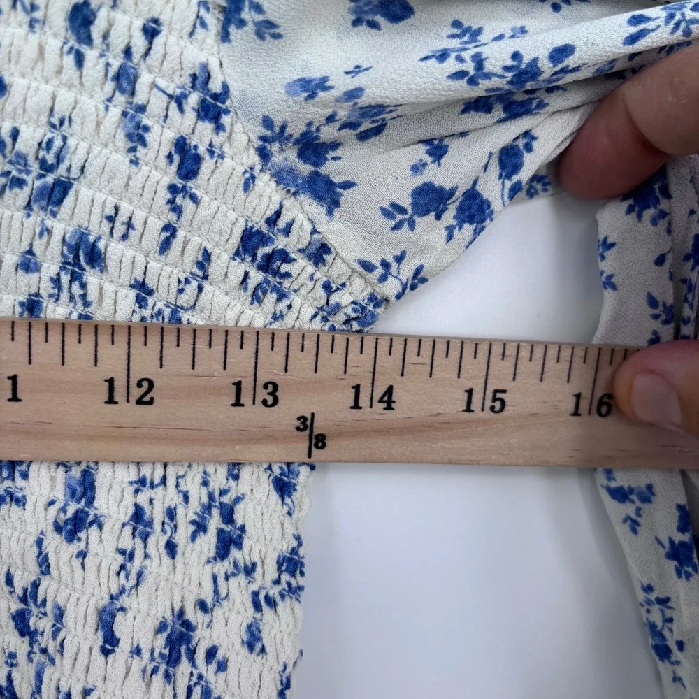 Reformation Braelyn Floral Top Womens L Blue Smocked Peplum Tie Back Blouse